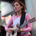 amy jo johnson busking in pink power ranger costume